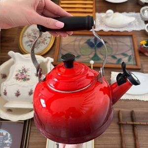 Le Creuset Red Enamel Whistling Tea Kettle with Black Handle